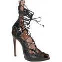 Alaïa high heel sandals in black strappy leather