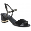 Stuart Weitzman Women's squared heels sandals in black leather with gold studs